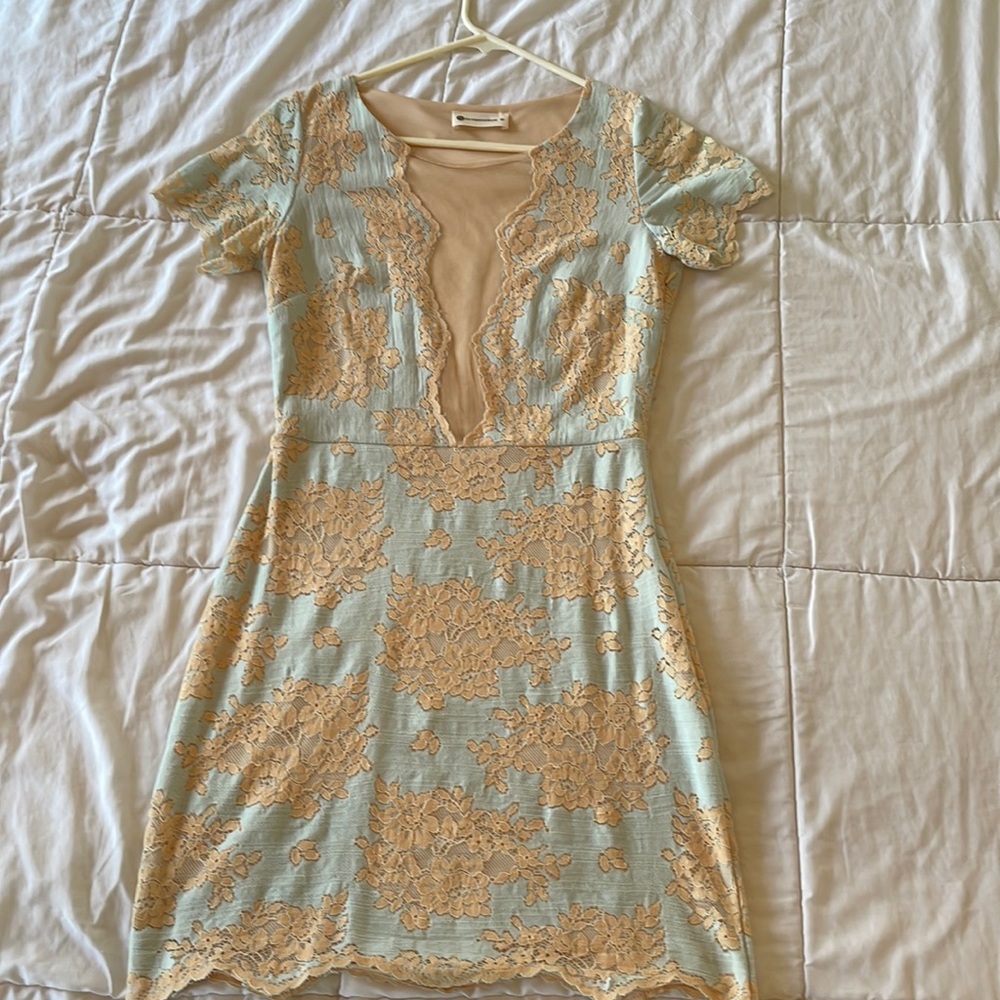 Elegant lace embroidered dress.